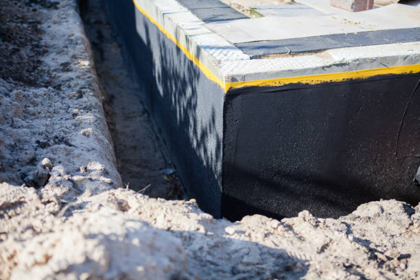 Professional Exterior Waterproofing technician working in Haddonfield, NJ